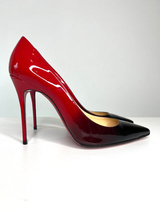 Red high-heeled shoe on a white background