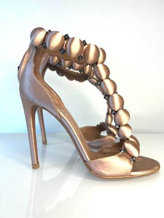 Alaia Bombe metallic rose gold satin high-heeled sandal with a unique beaded wrap-around strap