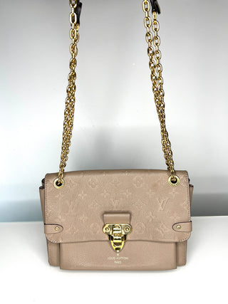 Louis Vuitton Pre-Loved Vavin PM beige Empreinte Leather Shoulder Bag