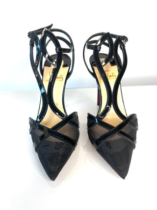 A pair of Christian Louboutin black patent leather and sheer mesh pointed-toe high heels
