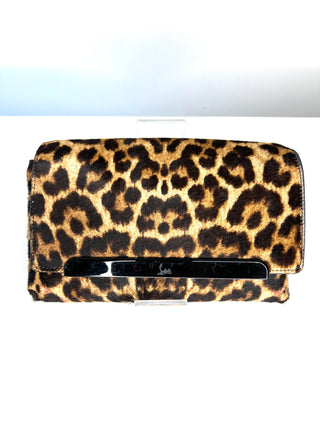 Christian Louboutin Rougissime leopard print clutch bag with a black metal bar clasp.