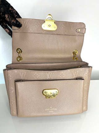 Louis Vuitton Pre-Loved Vavin PM beige Empreinte Leather Shoulder Bag