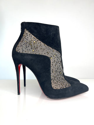 Black suede high heeled ankle boots with embellished mesh panels and red soles