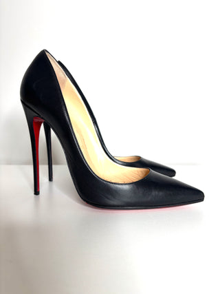 Black leather high heels with red soles