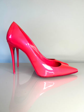 Christian Louboutin Kate bright pink patent leather high-heeled pump with a pointed toe and slim stiletto heel and red sole
