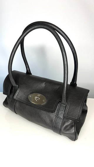 Dark grey handbag with a visible Mulberry brand logo on a white background