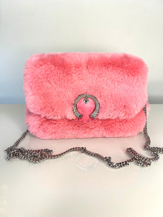 Jimmy Choo pink faux fur shoulder bag with a silver-tone chain strap and a pink and silver horseshoe-shaped metal clasp with crystal embellishment