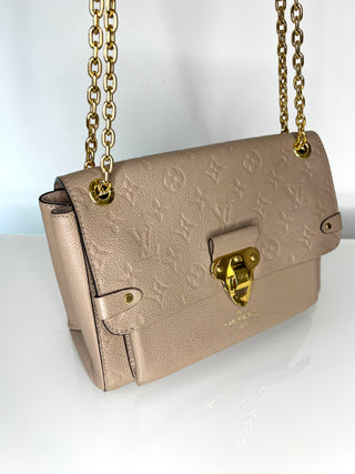 Louis Vuitton Pre-Loved Vavin PM beige Empreinte Leather Shoulder Bag