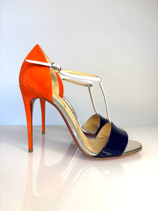 Christian Louboutin high-heeled T-strap sandal with a bright orange suede heel and side panel, navy patent leather strap and white T-strap
