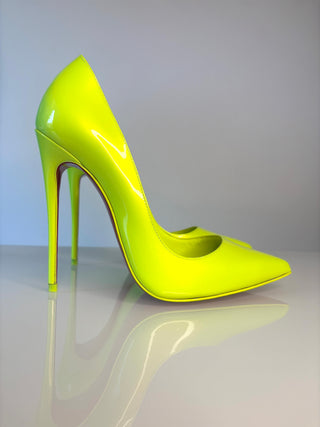 Christian Louboutin So Kate Neon yellow patent leather high heeled pumps