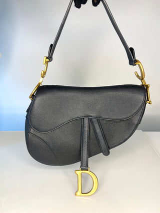 Christiaon Dior Saddle bag in black grained leather with antique gold D charm