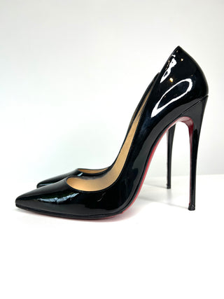 Black high-heeled shoe on a white background