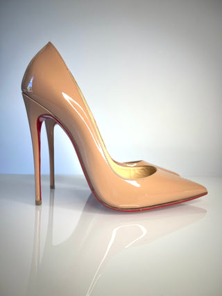 Christian Louboutin So Kate high-heeled pump in glossy nude patent leather with a signature red sole.