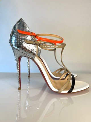 Christian Louboutin  high-heeled sandal with a metallic silver snakeskin-patterned heel, multicolour T-strap details and orange ankle strap