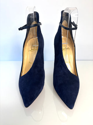 Navy blue high heels with a brand logo on a white background