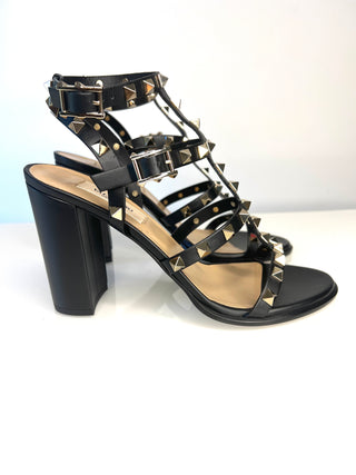 Valentino Garavani Rockstud Black high-heeled sandal with metallic studs