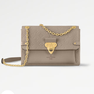 Louis Vuitton Pre-Loved Vavin PM beige Empreinte Leather Shoulder Bag
