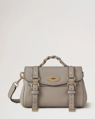 Gray handbag with gold-tone postman's lock on front flap