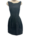 Black unlined dress with back scoop cut, sewn in detail and discreet zip
