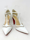 White Patent Leather and Mesh Block Heel and T Strap. Signature red soles