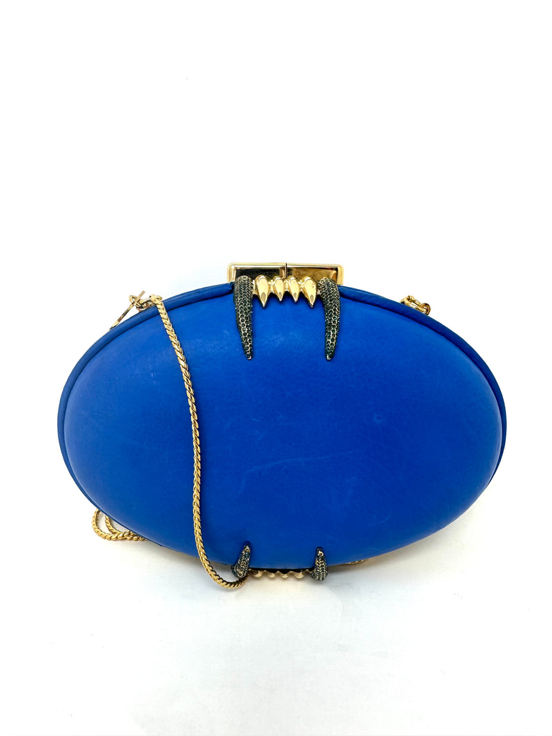 royal blue box circle clutch with gold hardware 