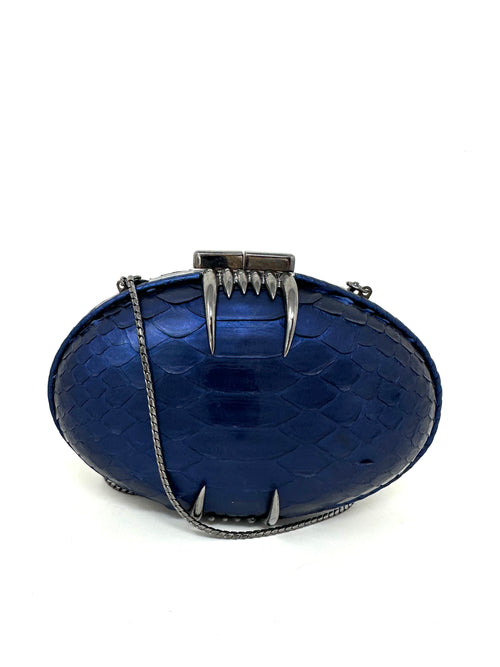 deep metallic blue python box clutch with signature teeth and silver chain 