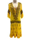 Silk yellow dress with gold beaded and sequin design. Sheer and lined dress