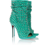 Teal blue suede peep toe booties with silver spikes and signature red soles