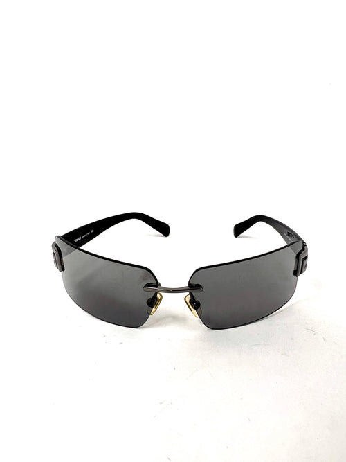 Dark lense frameless sunglasses 