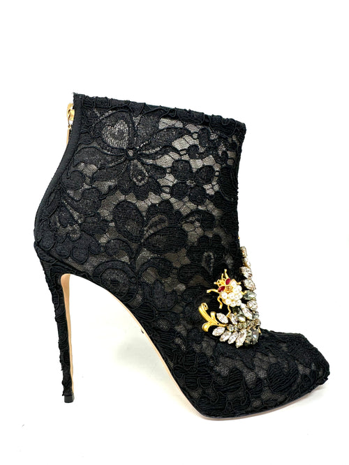 Black lace ankle booties with crystal embellishment and peep toes